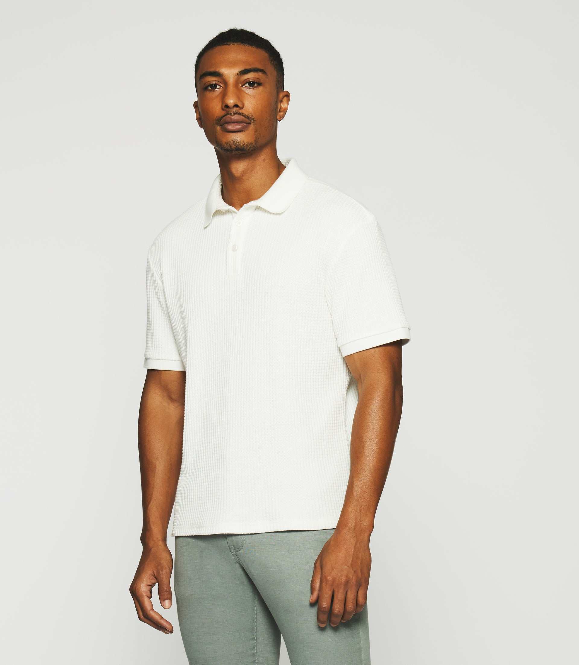 Polo uni en maille fantaisie blanc GEORGE
