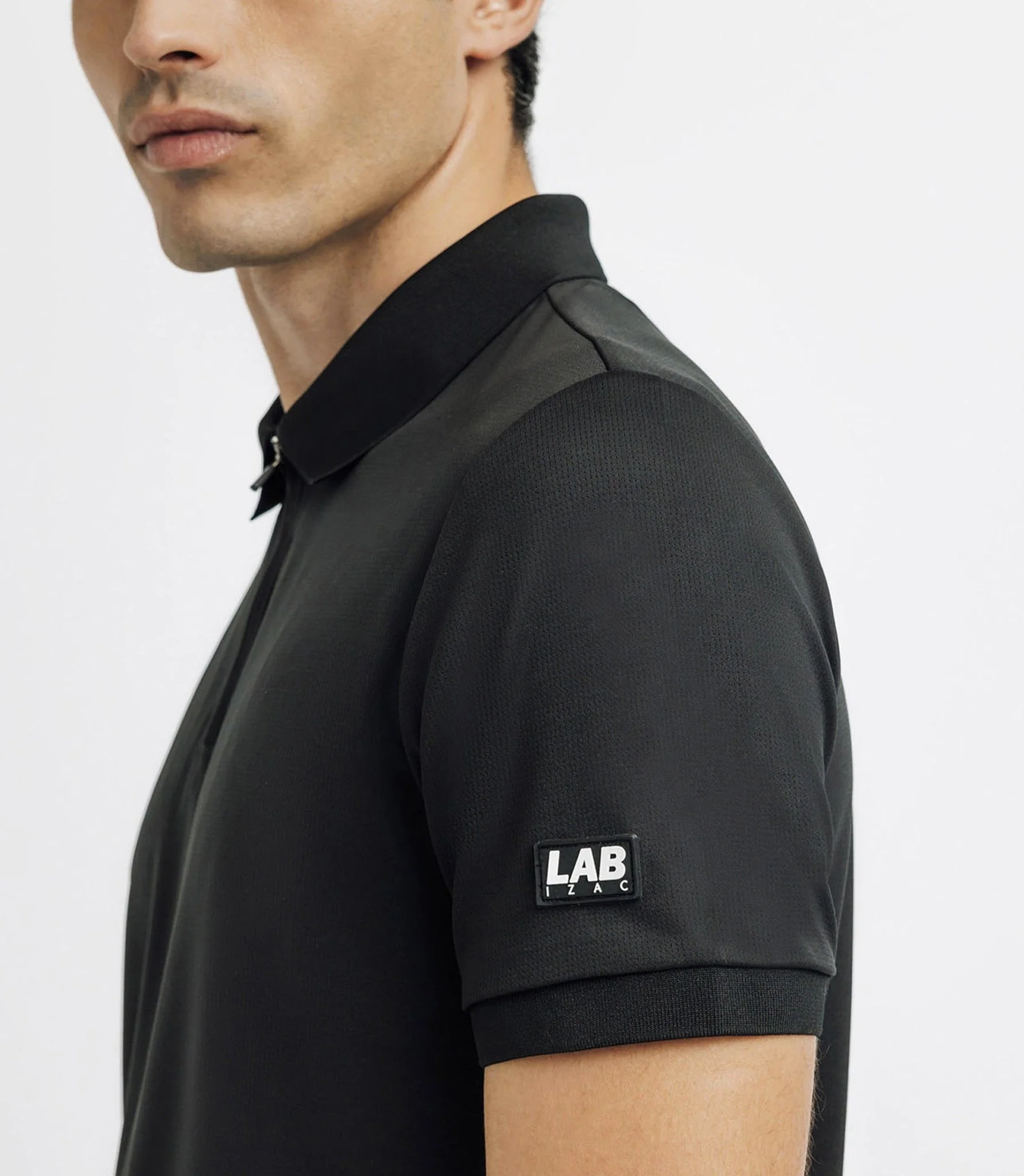 Polo col zippé avec patch noir - Image 2